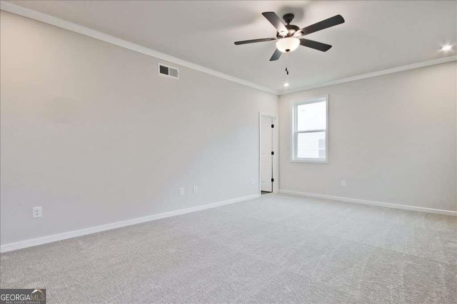 Spacious, unfurnished interior of a new home in The Paddocks at Doc Hughes, Buford (Image 53).