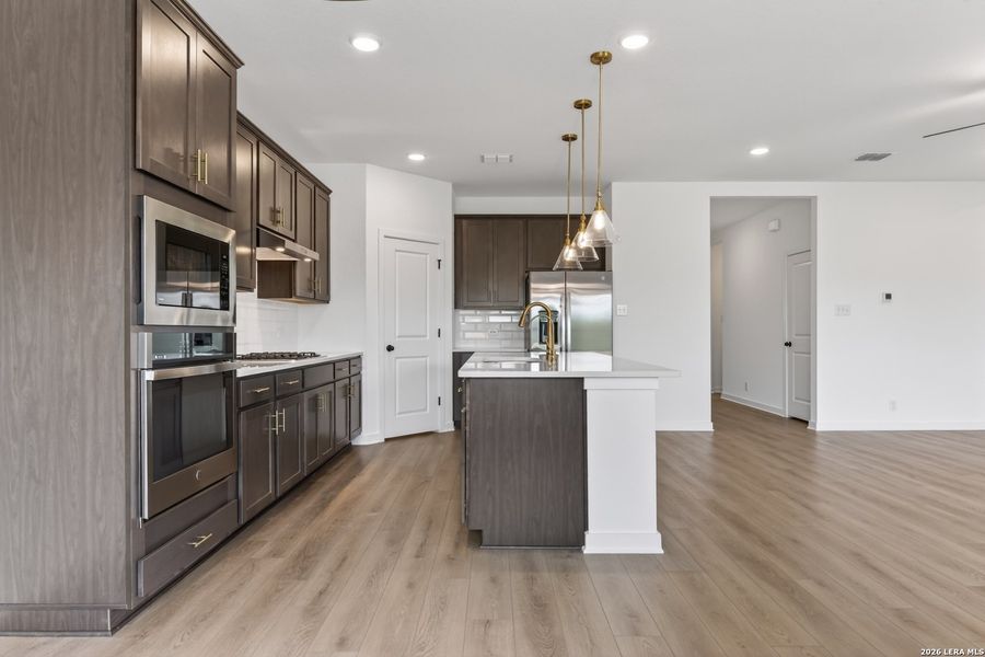 Furnished interior view inside a new home in Nopal Valley, San Antonio (Image 9).