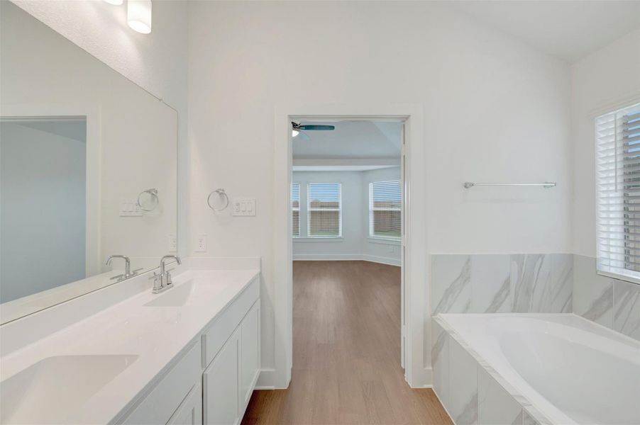 Furnished interior view inside a new home in Sorella, Tomball (Image 17).