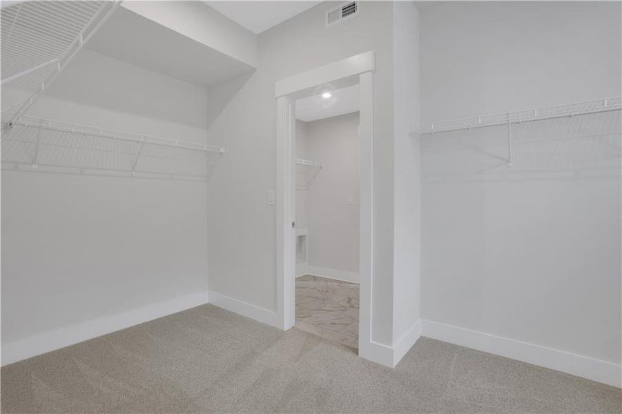 Spacious, unfurnished interior of a new home in The Paddocks at Doc Hughes, Buford (Image 28).