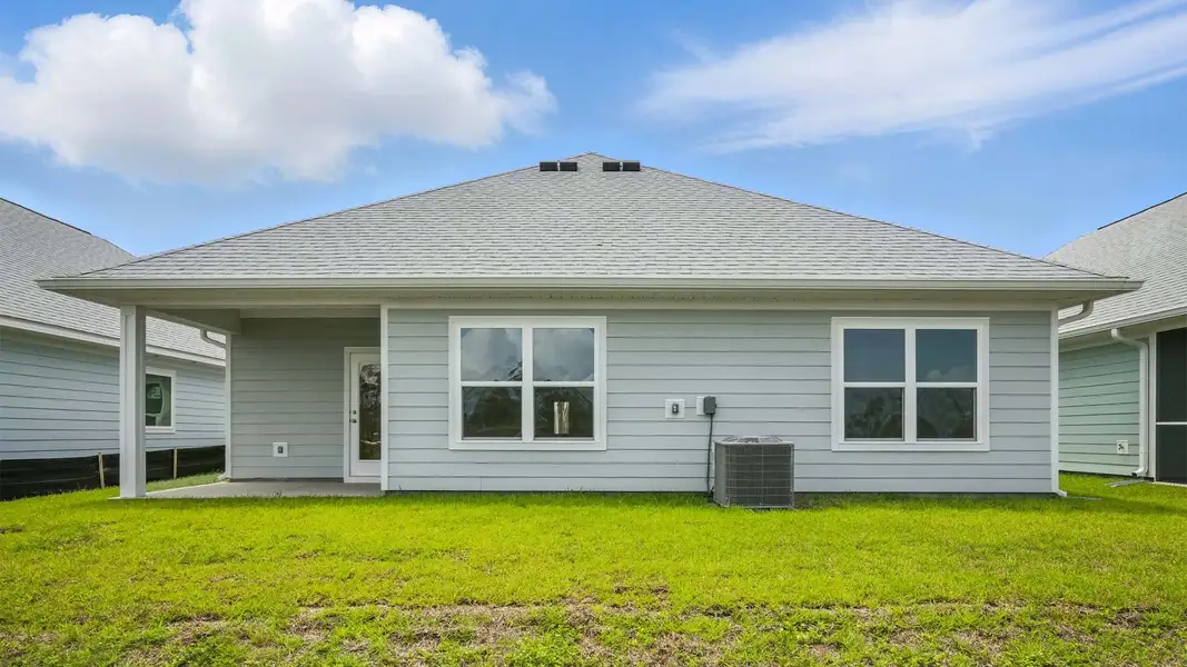 Exterior details and patio area of a home in WindMark Beach, Port Saint Joe (Image 3).