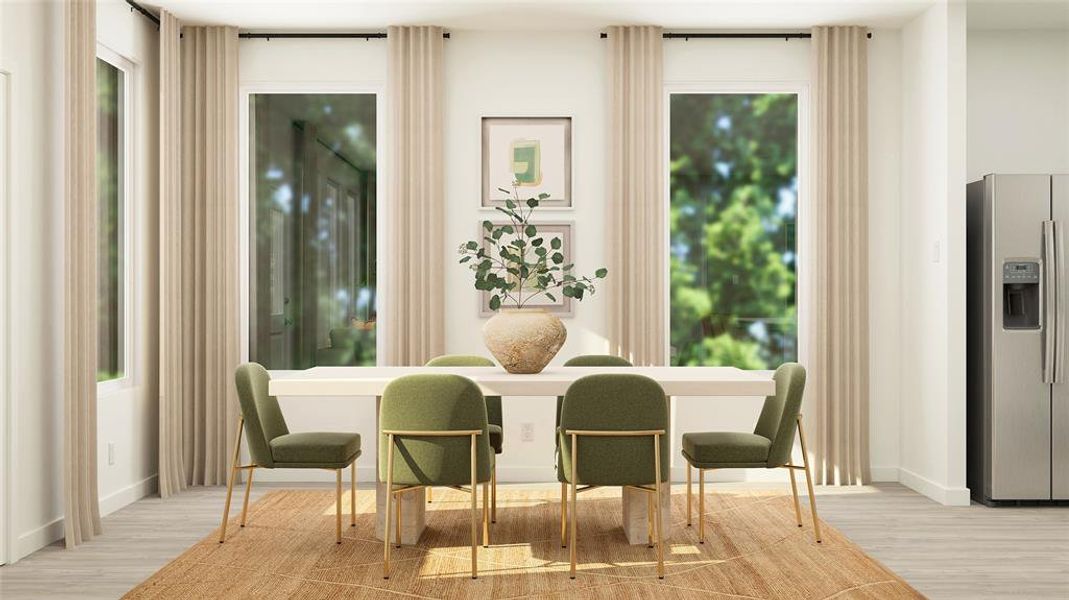 Dining space featuring light hardwood / wood-style flooring