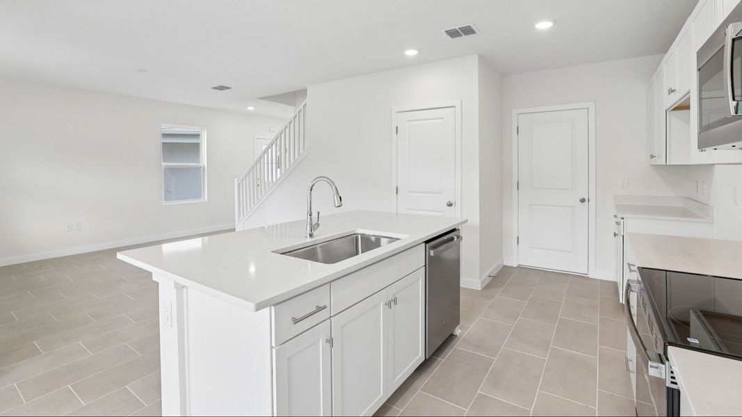 Furnished interior view inside a new home in Cyrene at Harmony, St. Cloud (Image 15).
