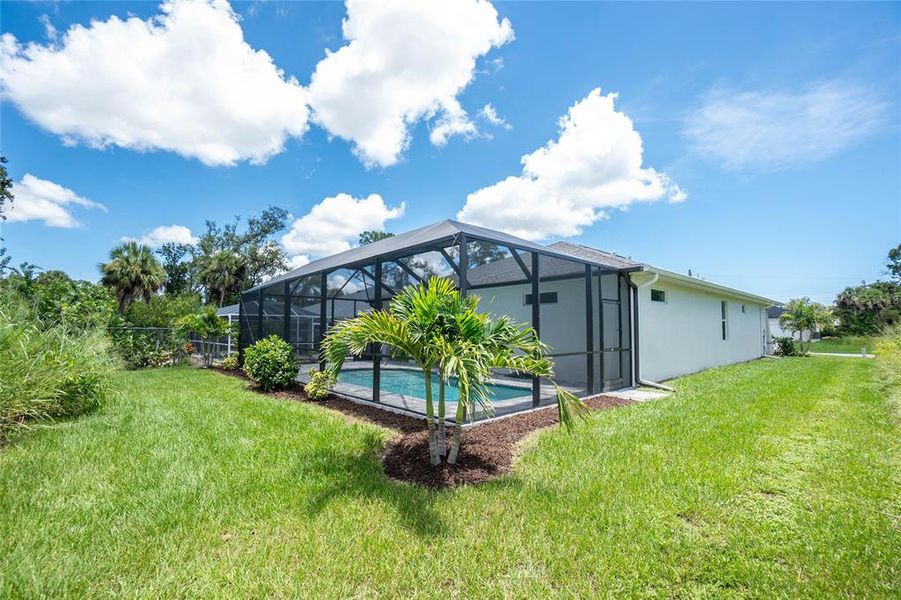 Front exterior of a new home in , Rotonda West, FL, highlighting curb appeal (Image 24). Front exterior of a new home in , Rotonda West, FL, highlighting curb appeal (Image 24).