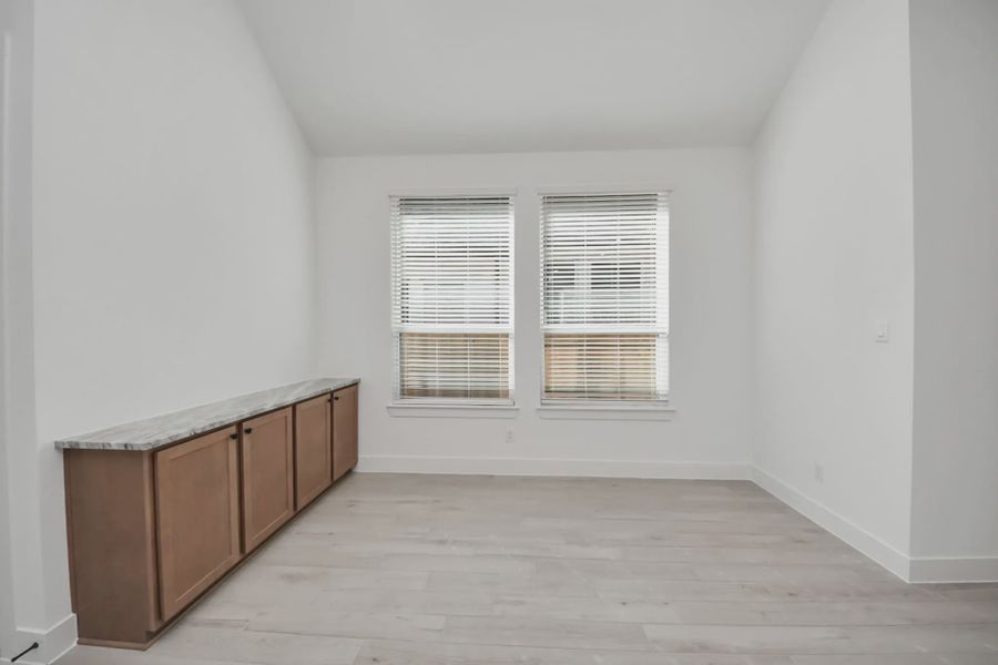 Representative unfurnished interior of a home built from the Summerton by Chesmar Homes in Meridiana 50's and 60's, Manvel (Image 57).