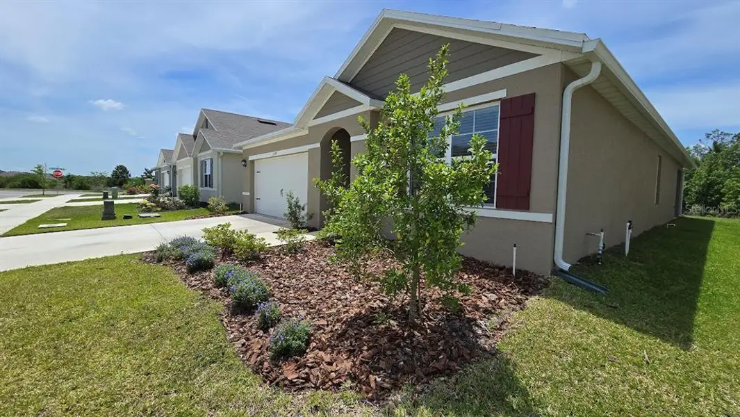 Front exterior of a new home in , Lakeland, FL, highlighting curb appeal (Image 2). Front exterior of a new home in , Lakeland, FL, highlighting curb appeal (Image 2).