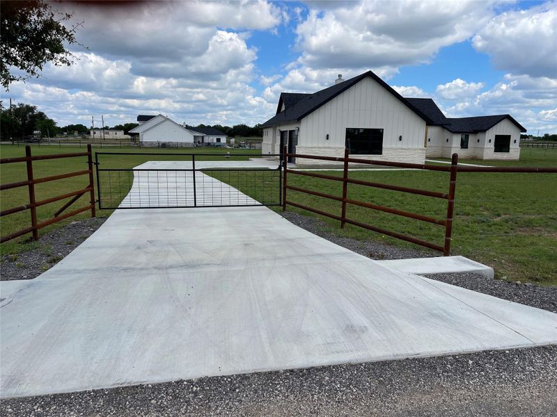 Front exterior of a new home in , Georgetown, TX, highlighting curb appeal (Image 1).
