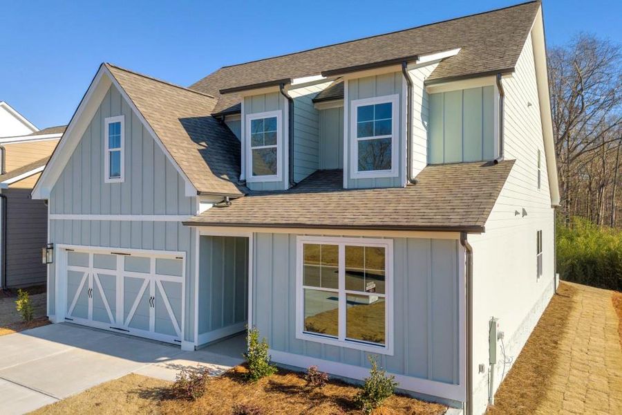 Front exterior of a new home in , Hartwell, GA, highlighting curb appeal (Image 1).