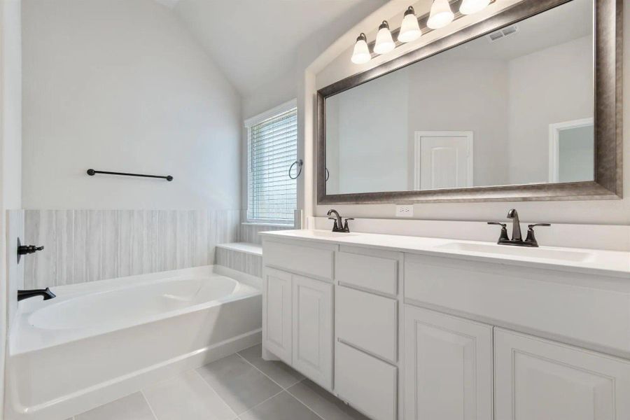 Primary Bathroom | Concept 2393 at Lovers Landing in Forney, TX by Landsea Homes