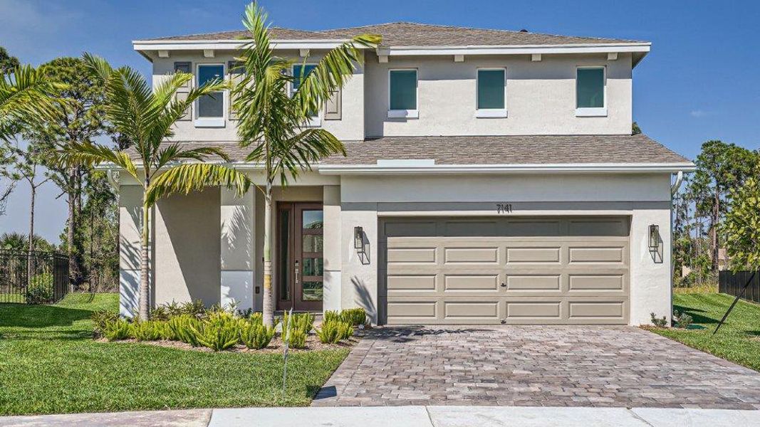 Representative exterior photo of a completed home built from the Ponte Vedra by D.R. Horton in Preserves at Park Trace, Stuart, FL (Image 1).
