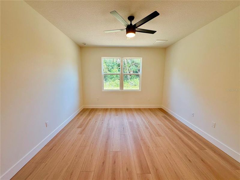Spacious, unfurnished interior of a new home in , Port Charlotte (Image 40).
