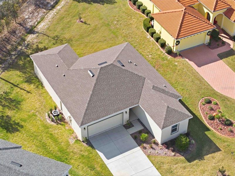 Front exterior of a new home in , Weeki Wachee, FL, highlighting curb appeal (Image 22).