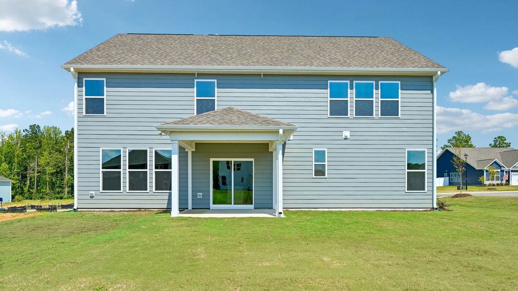 Exterior details and patio area of a home in Eagle Creek, Fuquay Varina (Image 19).