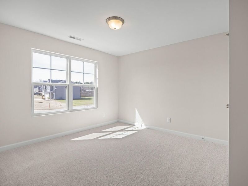 Spacious, unfurnished interior of a new home in Wellers Knoll, Lillington (Image 24).