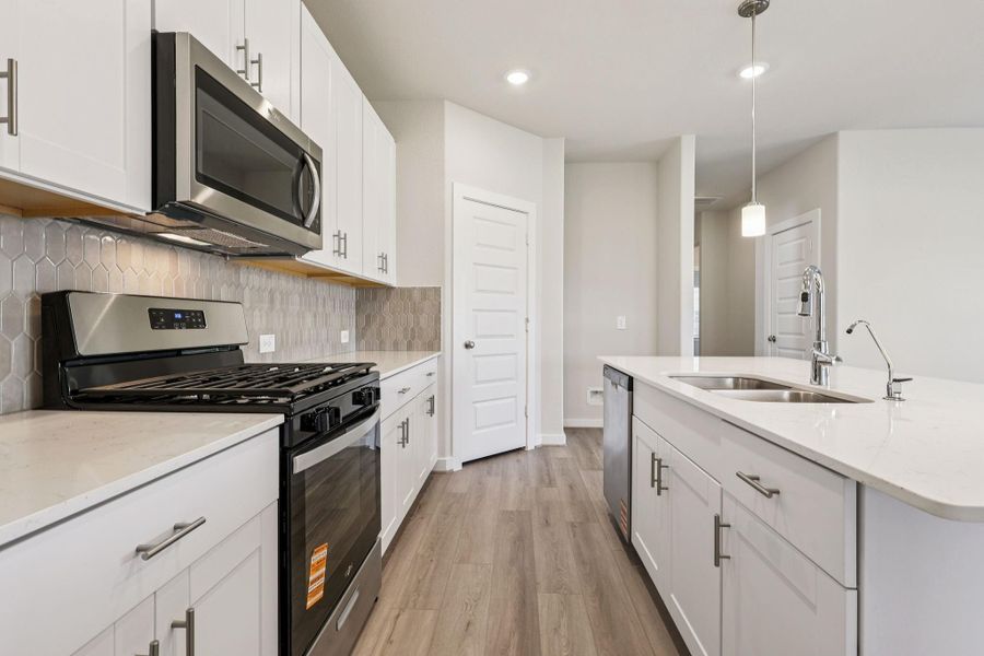 Photo is not of the actual home, but is an inspirational photo of builder’s model home and may depict options, furnishings, and/or decorator features that are not included Photo is not of the actual home, but is an inspirational photo of builder’s model home and may depict options, furnishings, and/or decorator features that are not included