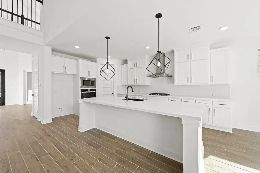Representative furnished interior of a home built from the The Ellington III by Westin Homes in Parkside On The River, Georgetown (Image 3). Representative furnished interior of a home built from the The Ellington III by Westin Homes in Parkside On The River, Georgetown (Image 3).