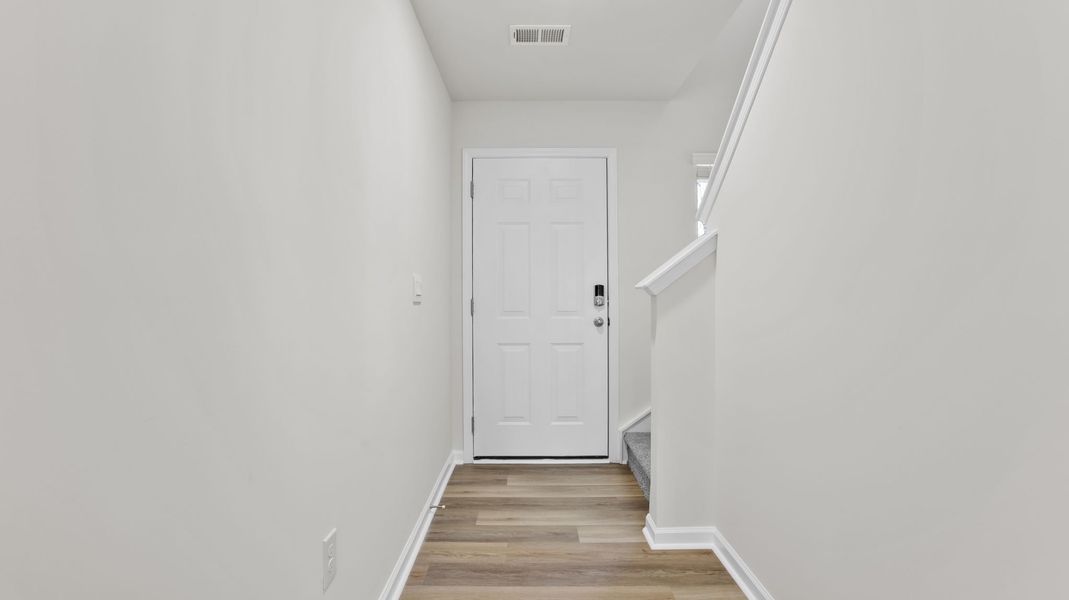 Spacious, unfurnished interior of a new home in Tanglewood Townes, Greenville (Image 13).