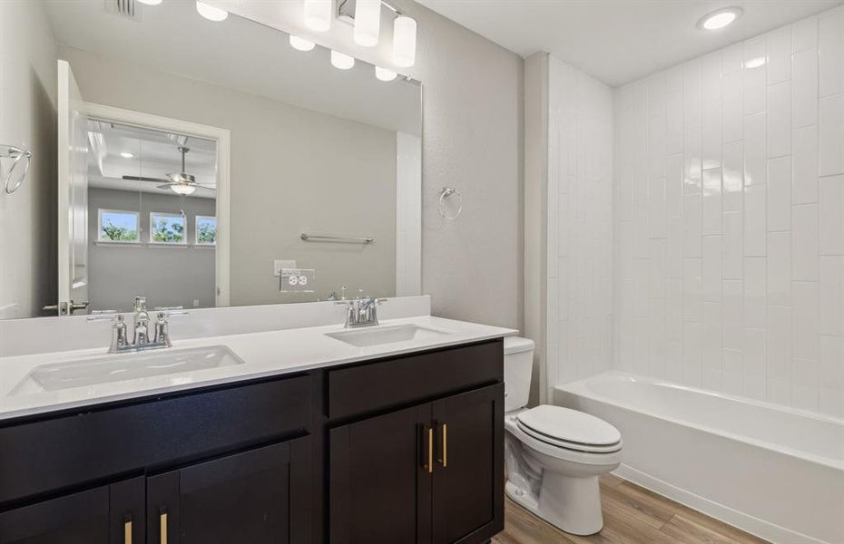 Upgraded secondary bathroom *real home pictured