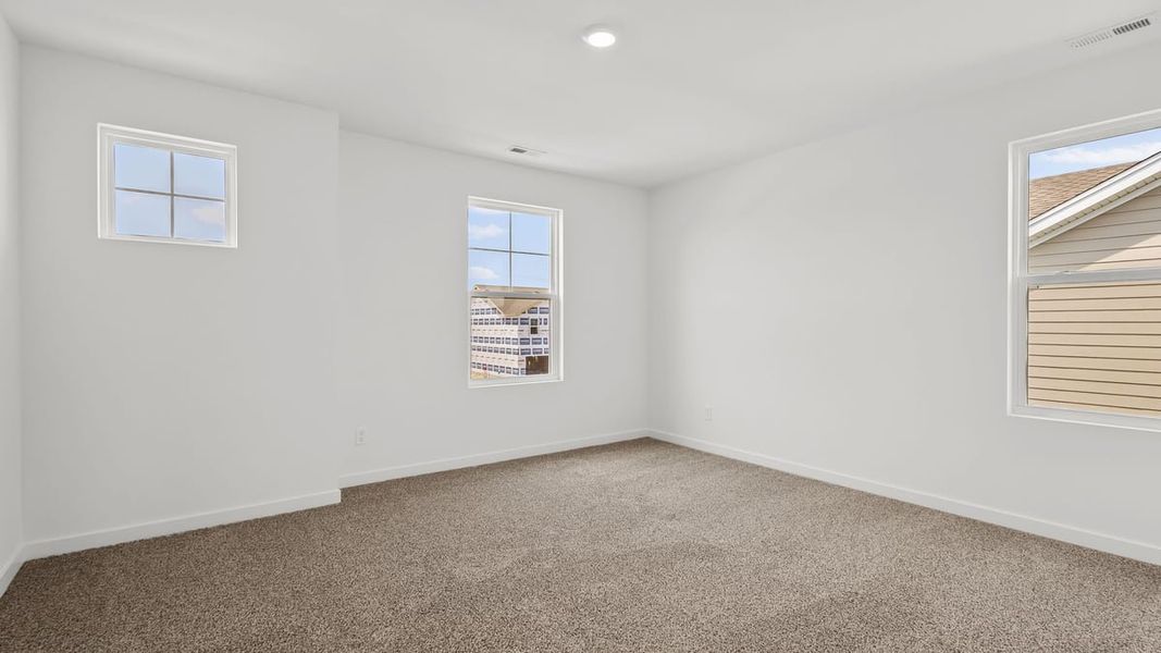 Representative unfurnished interior of a home built from the Holcombe by D.R. Horton in Peachtree Meadows, Rockwall (Image 41).