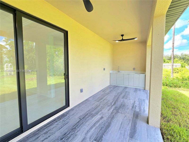 Exterior details and patio area of a home in , Lehigh Acres (Image 3). Exterior details and patio area of a home in , Lehigh Acres (Image 3).