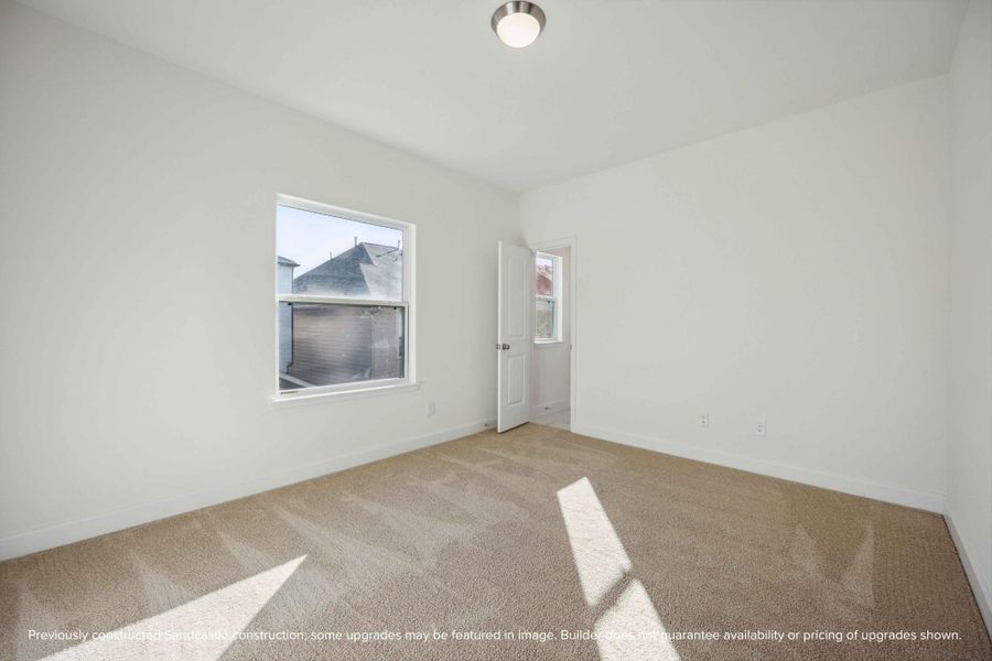 Bright, airy, and ready to become a cozy retreat, this bedroom offers the perfect blank canvas for your personal style. Bright, airy, and ready to become a cozy retreat, this bedroom offers the perfect blank canvas for your personal style.