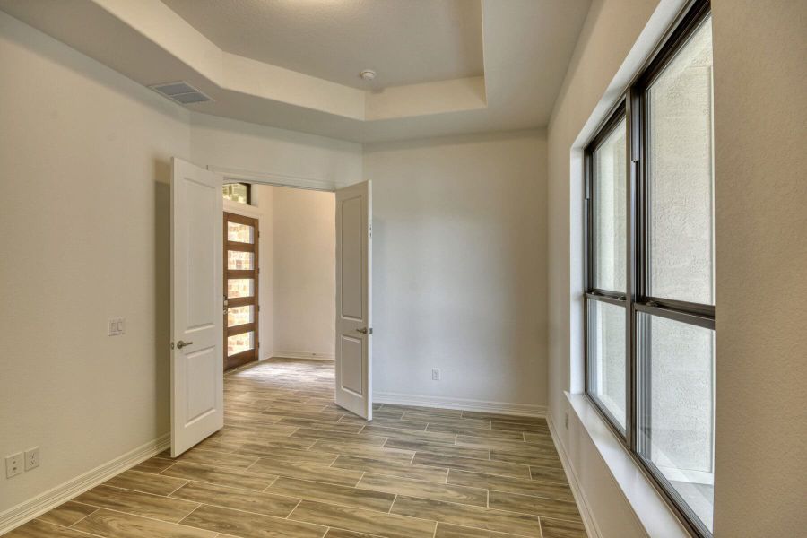 Spacious, unfurnished interior of a new home in El Sonido at Campanas, San Antonio (Image 33).