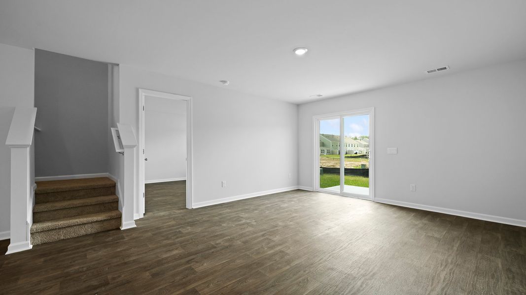 Representative unfurnished interior of a home built from the MURRAY TH by D.R. Horton in Pine Hills Townhomes at Cane Bay, Summerville (Image 19).