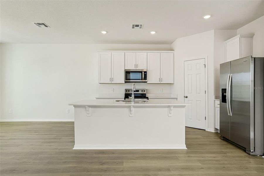 Furnished interior view inside a new home in The Meadow at Crossprairie Bungalows, St. Cloud (Image 6).