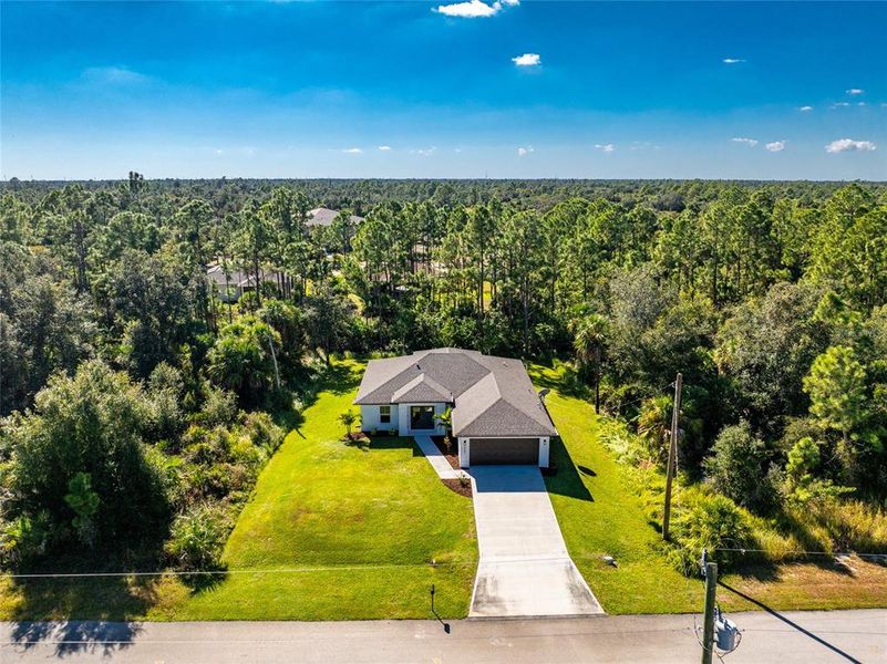 Front exterior of a new home in , North Port, FL, highlighting curb appeal (Image 1).