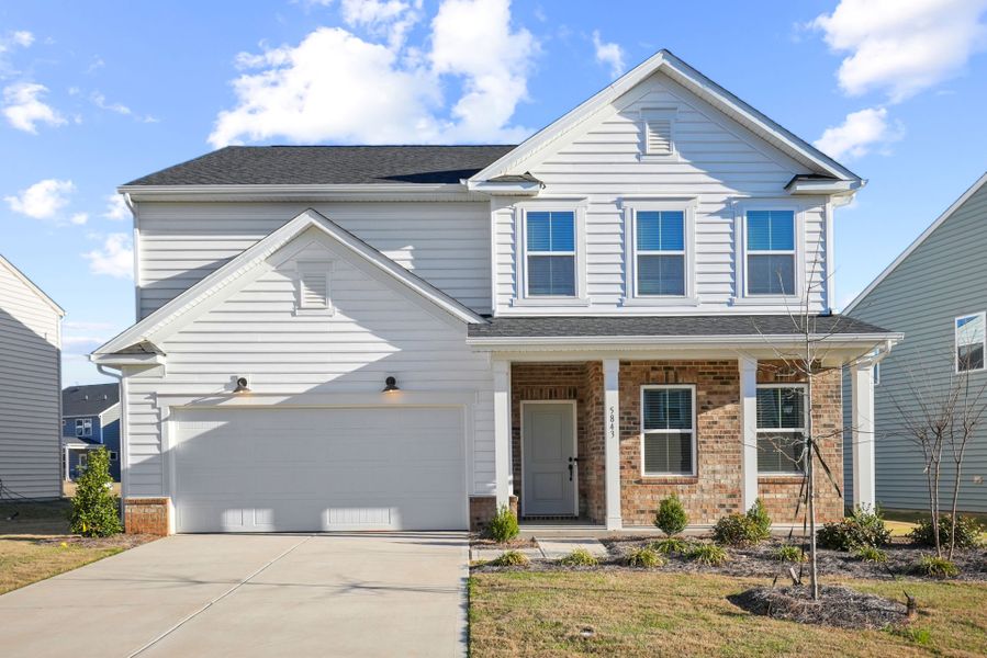 Representative exterior photo of a completed home built from the Hampton by Pulte Homes in Stewarts Landing, Charlotte, NC (Image 23). Representative exterior photo of a completed home built from the Hampton by Pulte Homes in Stewarts Landing, Charlotte, NC (Image 23).