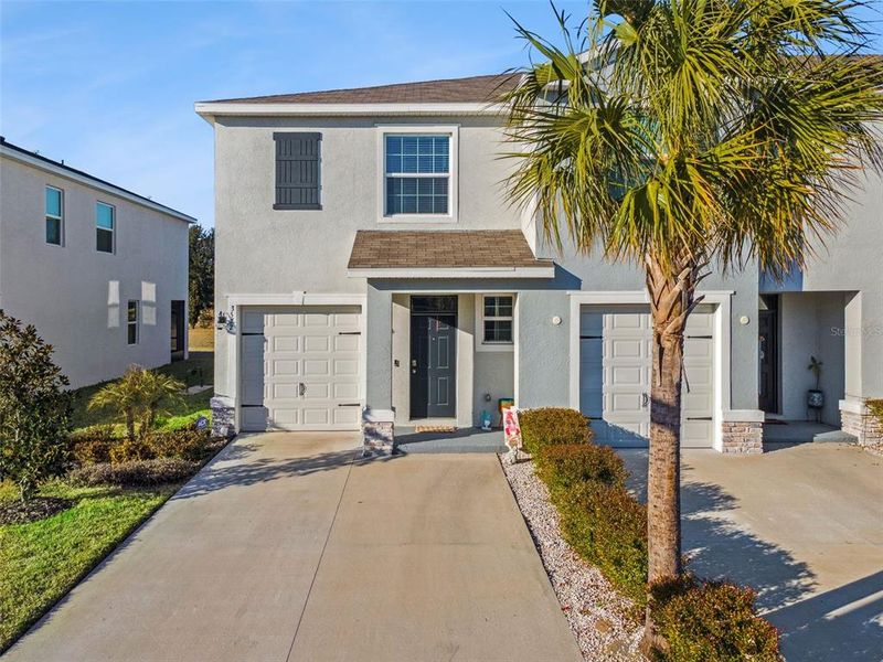 Front exterior of a new home in , Plant City, FL, highlighting curb appeal (Image 20). Front exterior of a new home in , Plant City, FL, highlighting curb appeal (Image 20).
