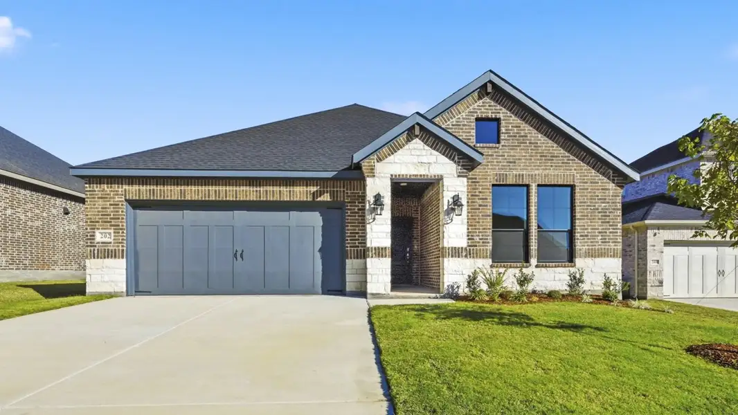 Front exterior of a new home in Morning Ridge, Princeton, TX, highlighting curb appeal (Image 1). Front exterior of a new home in Morning Ridge, Princeton, TX, highlighting curb appeal (Image 1).