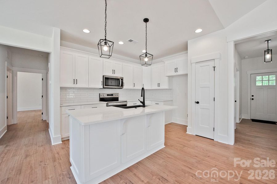Furnished interior view inside a new home in , Concord (Image 8).