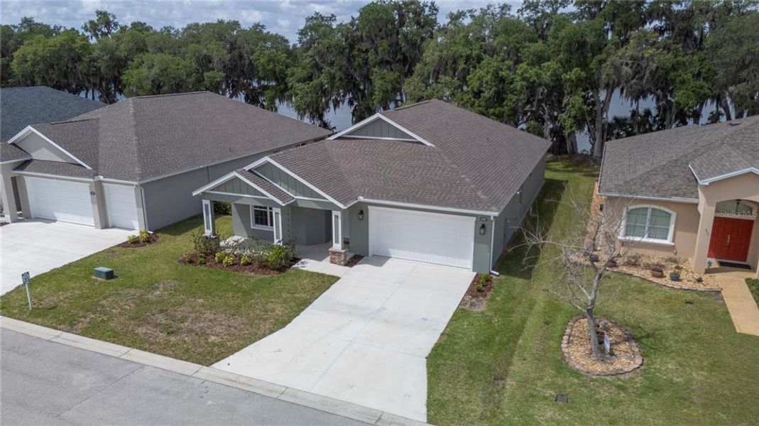Front exterior of a new home in , Mulberry, FL, highlighting curb appeal (Image 28).