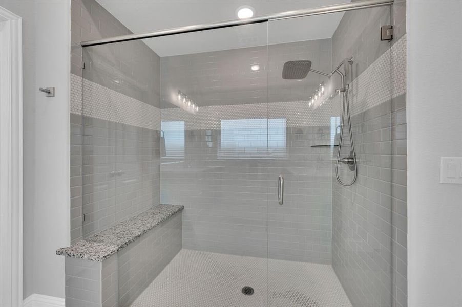 Great neutral colors and shower bench