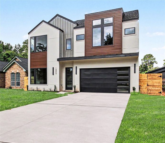 Front exterior of a new home in , Conroe, TX, highlighting curb appeal (Image 24).