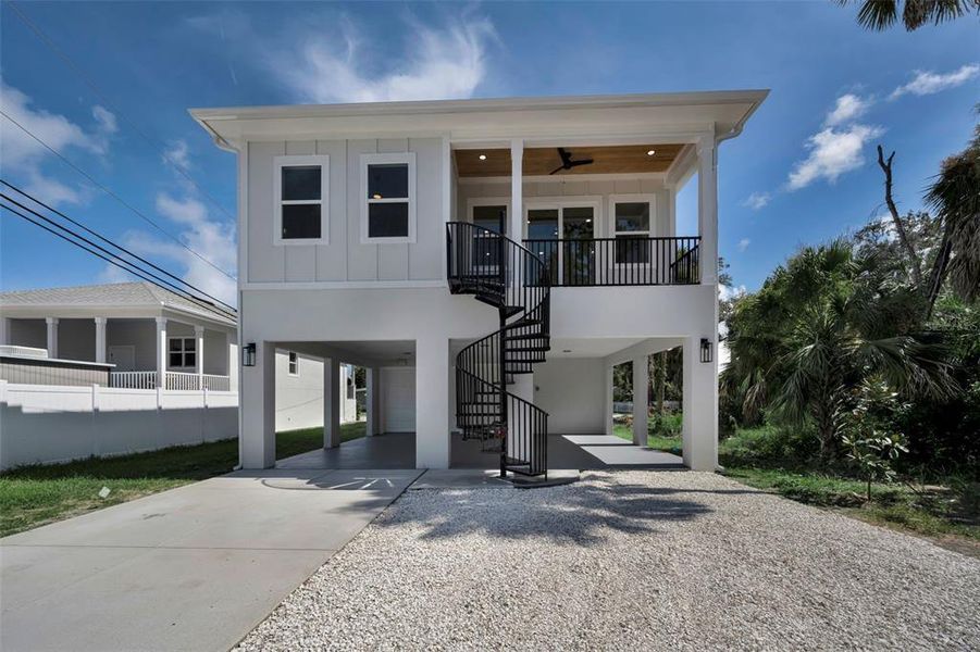 Front exterior of a new home in , Tarpon Springs, FL, highlighting curb appeal (Image 1). Front exterior of a new home in , Tarpon Springs, FL, highlighting curb appeal (Image 1).