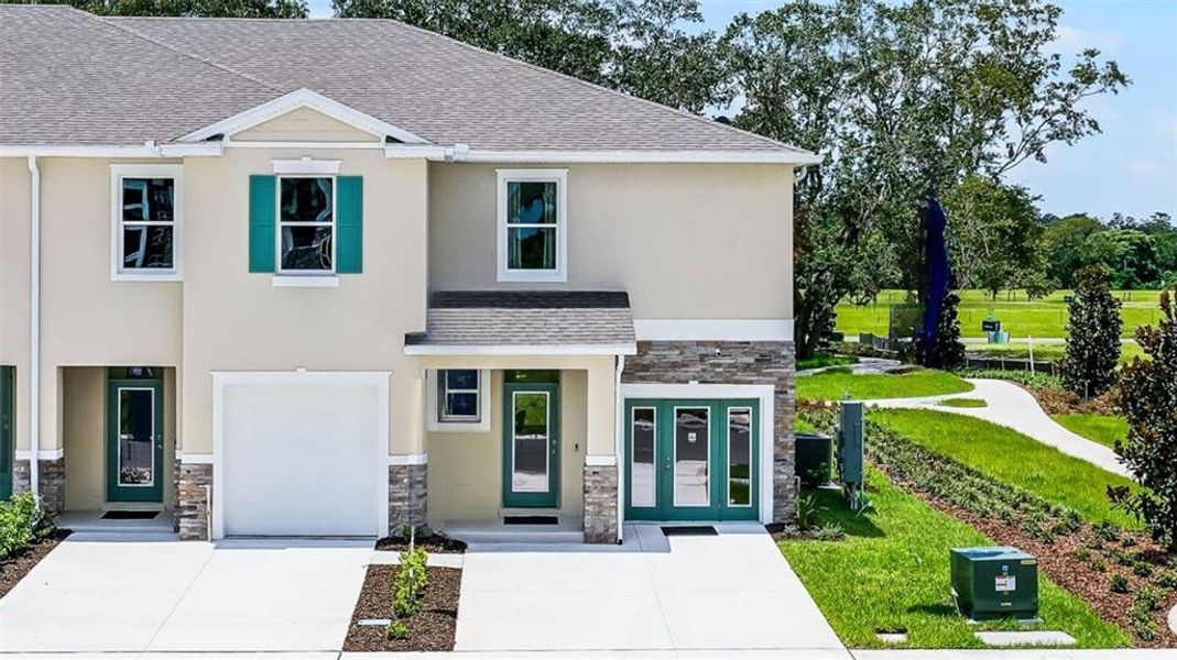 Front exterior of a new home in , Orlando, FL, highlighting curb appeal (Image 1). Front exterior of a new home in , Orlando, FL, highlighting curb appeal (Image 1).