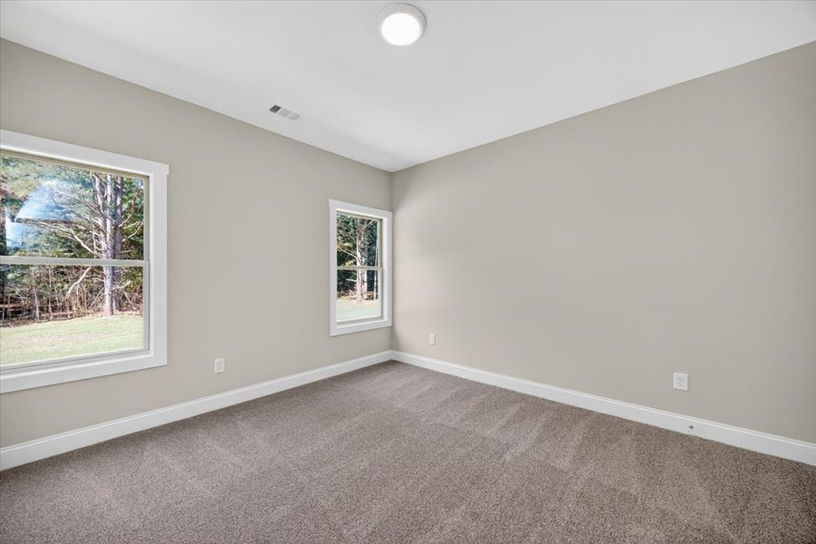 Spacious, unfurnished interior of a new home in White Oaks, The Rock (Image 28).