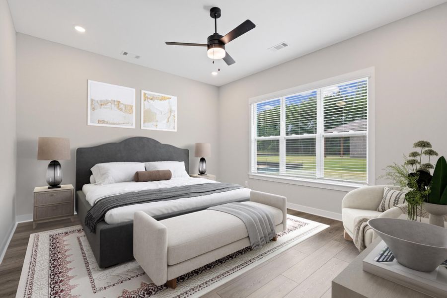 Bright bedroom featuring wood-finish flooring, a large multi-pane window with horizontal blinds, a ceiling fan with integrated lighting, recessed lighting, and light-toned walls Bright bedroom featuring wood-finish flooring, a large multi-pane window with horizontal blinds, a ceiling fan with integrated lighting, recessed lighting, and light-toned walls