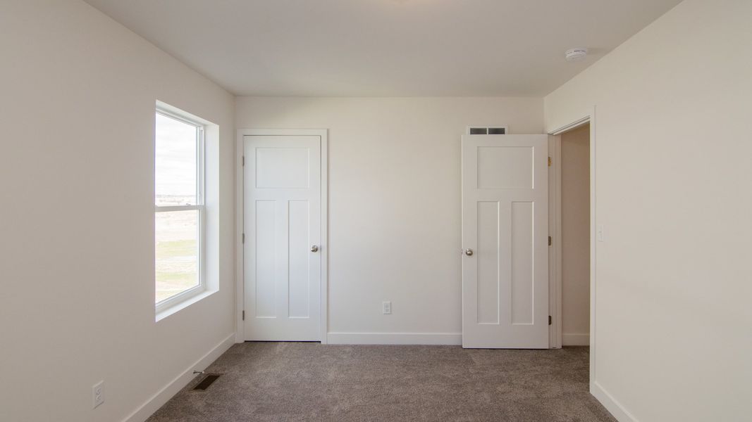 Representative unfurnished interior of a home built from the The Hartland by Norfolk Homes in Coronado Estates, Jackson (Image 72).