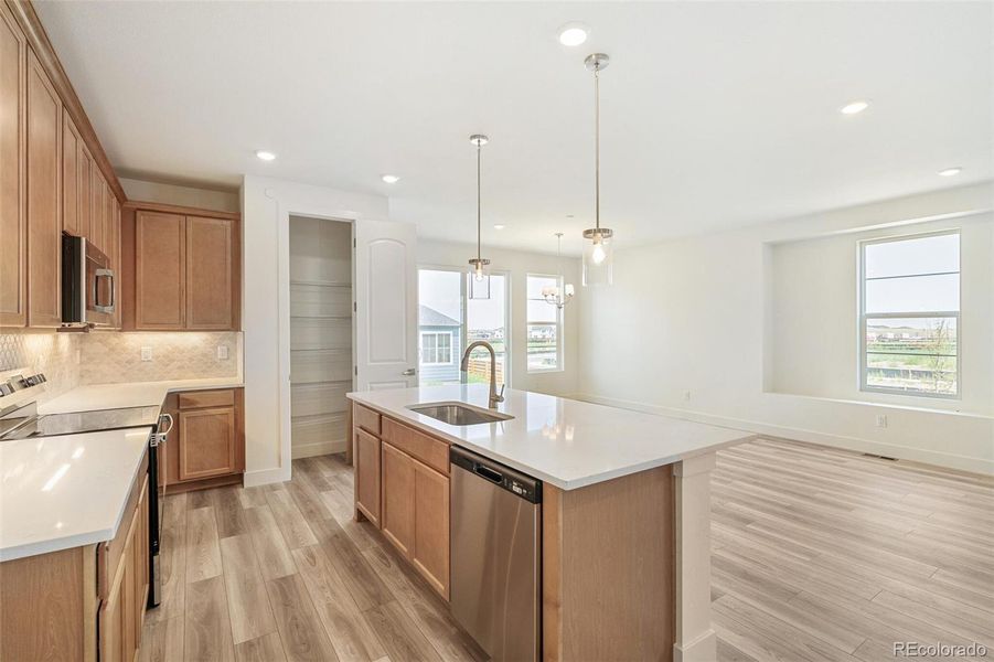Furnished interior view inside a new home in Legato, Commerce City (Image 12).