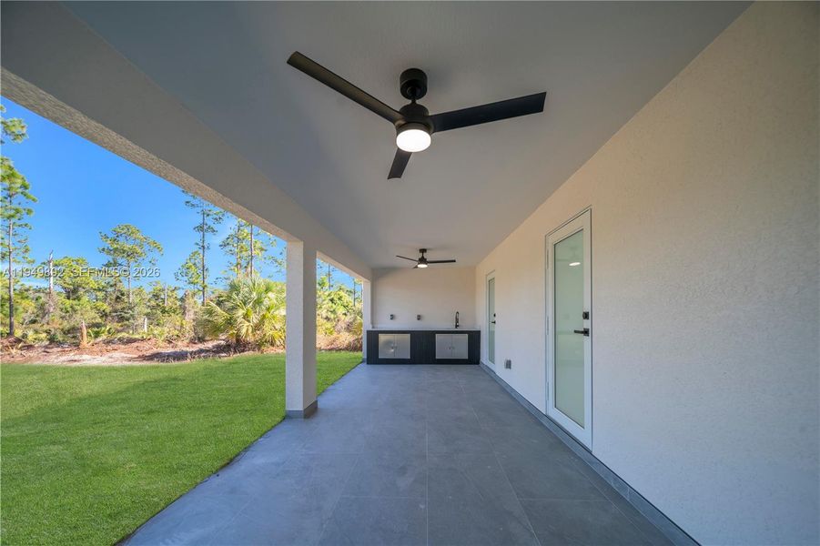 Exterior details and patio area of a home in , Lehigh Acres (Image 3).