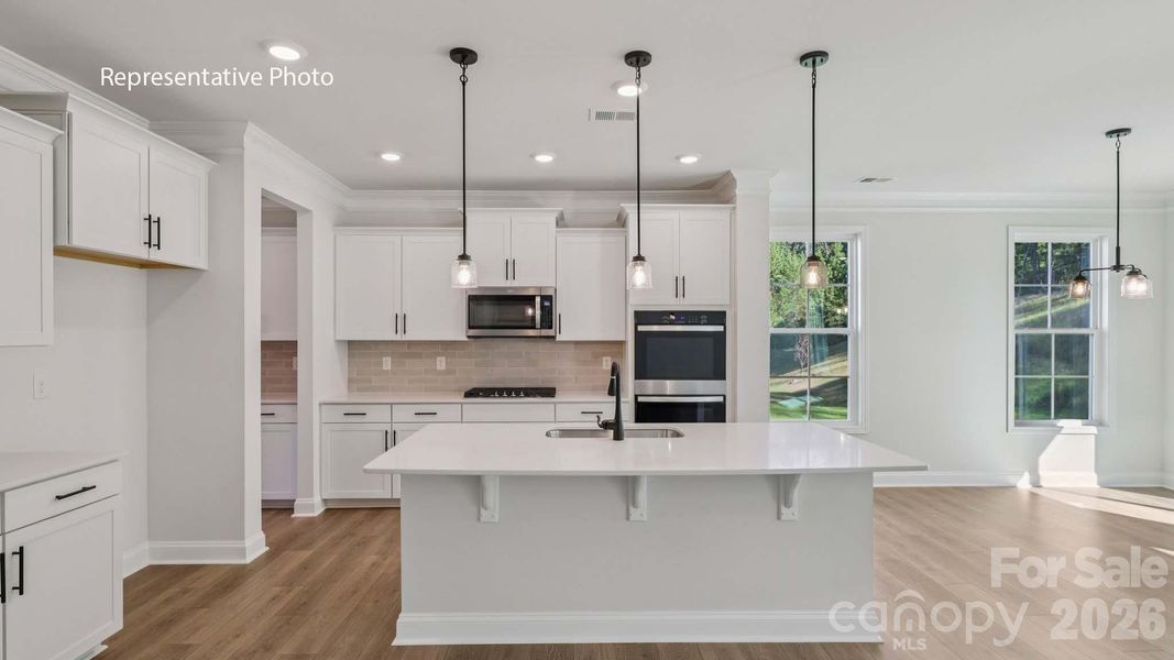 Furnished interior view inside a new home in Sanctuary at Southgate, Indian Trail (Image 5).