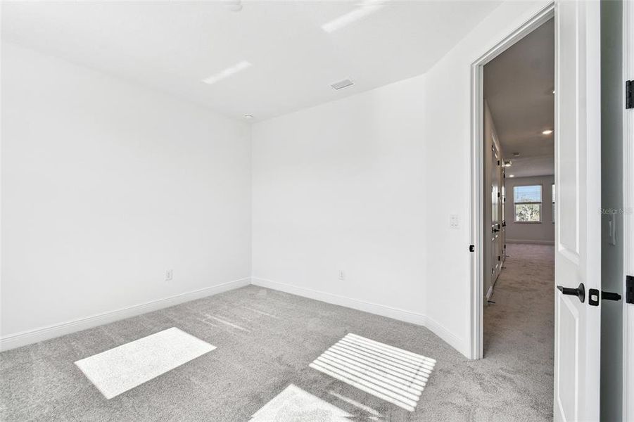 Spacious, unfurnished interior of a new home in Creeks Edge at Twin Rivers, Parrish (Image 64).