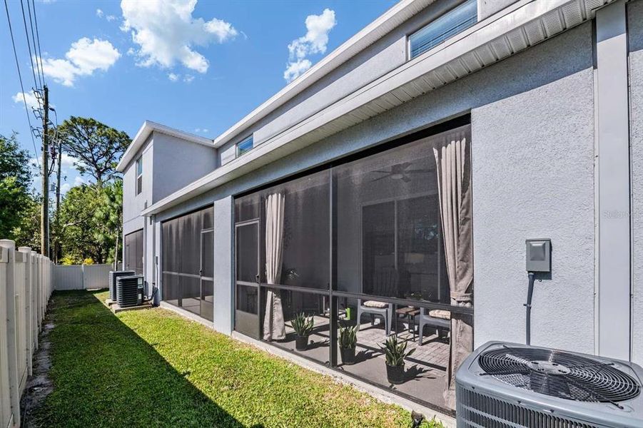 Exterior details and patio area of a home in Azalea Shores, Largo (Image 26).
