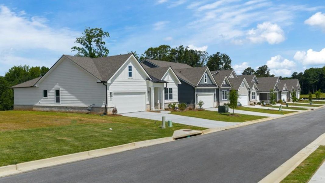 Front exterior of a new home in Hamptons at Riverwood North, Dallas, GA, highlighting curb appeal (Image 27).