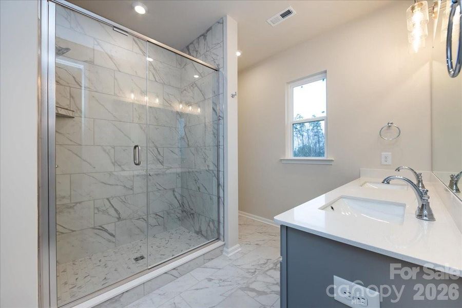 Primary Shower with Tile Walls and Tile Floor Pan