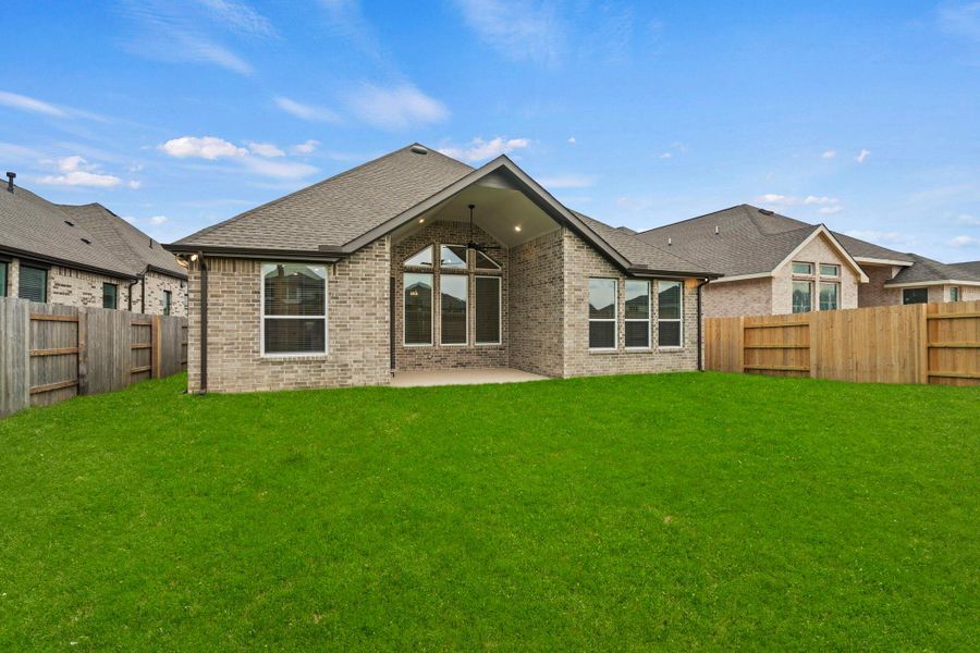 Exterior details and patio area of a home in Elyson 60's, Katy (Image 23).