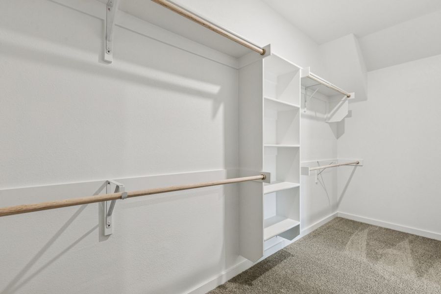 Primary Closet in the Heisman home plan by Trophy Signature Homes – REPRESENTATIVE PHOTO Primary Closet in the Heisman home plan by Trophy Signature Homes – REPRESENTATIVE PHOTO